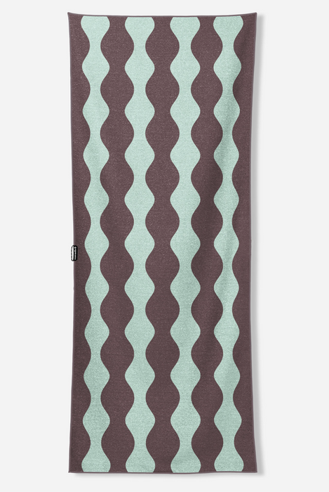 A long rectangular scarf with a repeating vertical wavy stripe pattern in dusty mauve and mint green, shown flat against a light gray background.