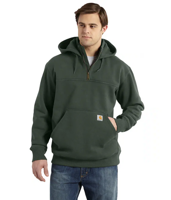 A man wearing a black Carhartt Rain Defender heavyweight quarter-zip hoodie with the brand logo visible on the chest.