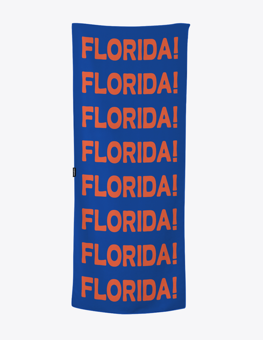 A rectangular blue towel featuring the word 'FLORIDA!' repeated vertically in orange block letters, shown against a light gray background.