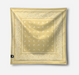A square bandana scarf in pale yellow-gold with a white paisley border and white crescent moon motifs in the center, shown flat against a light gray background.